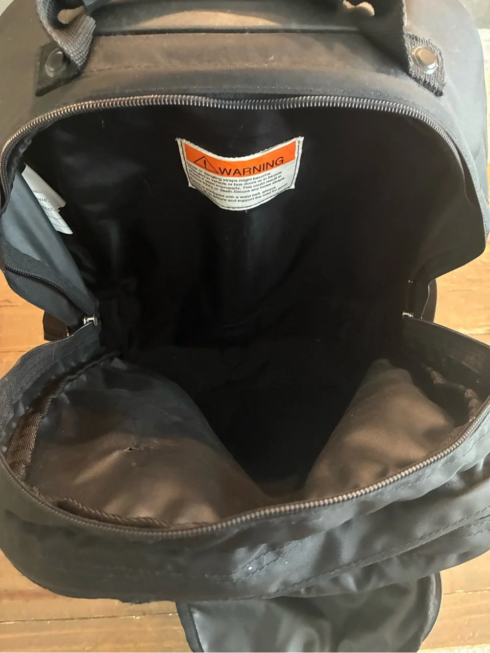 L.L. Bean Black Rolling Backpack with Silver Reflective Accent
